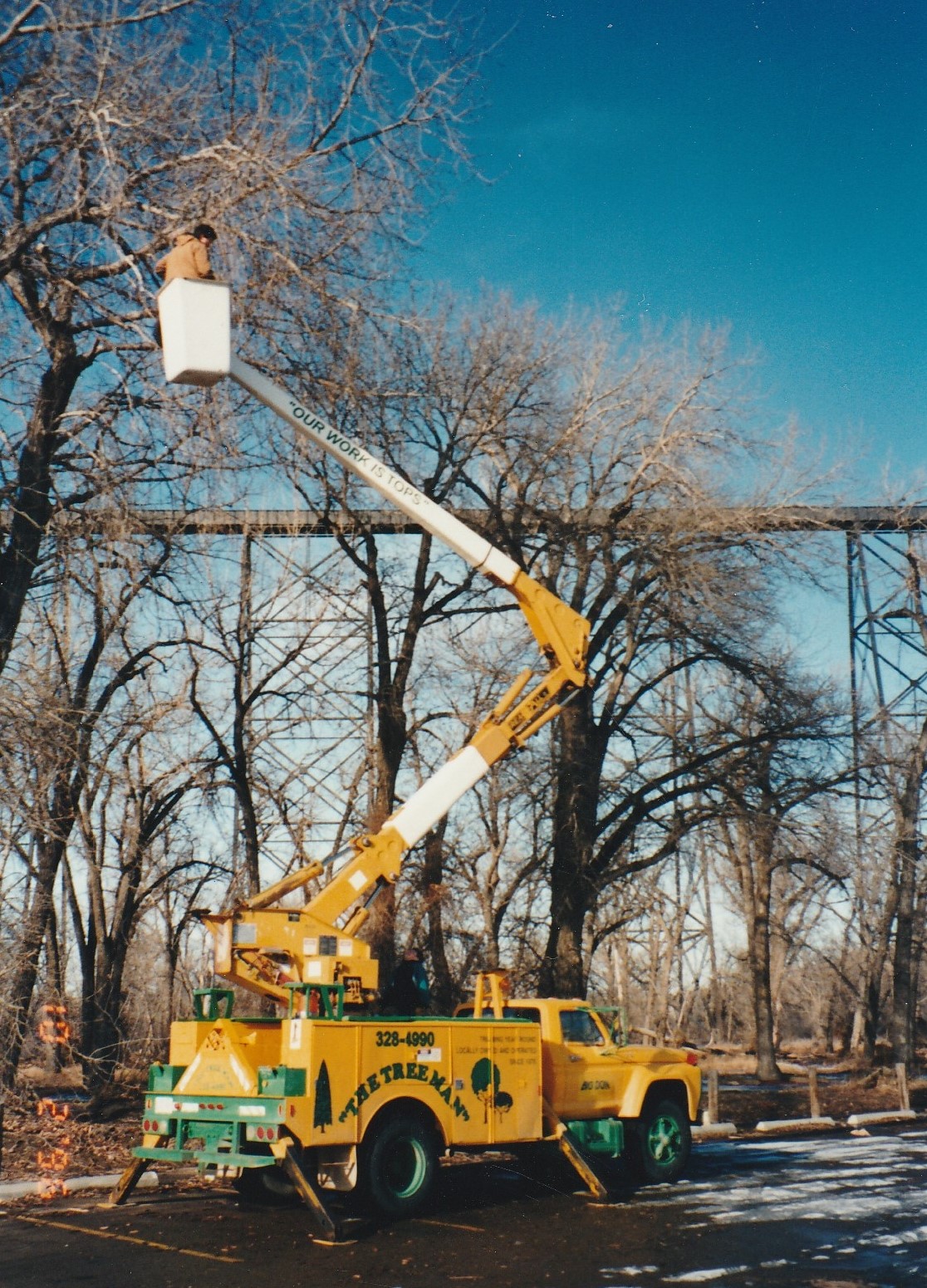 The Tree Man and Son bucket truck